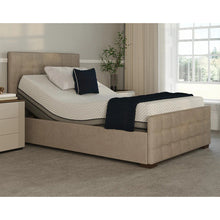 Load image into Gallery viewer, The Edel Dual is the perfect bed for couples who want individualized comfort. Each side of the bed can be controlled independently, so you can both find your perfect sleeping position. The detailed head and footboards give the Edel a luxurious look, and it&#39;s hand-made in Britain with the finest materials. The ergonomic handset makes it easy to adjust your side of the bed, and the soft-touch buttons with illuminating icons make it simple to find your way to ultimate comfort.