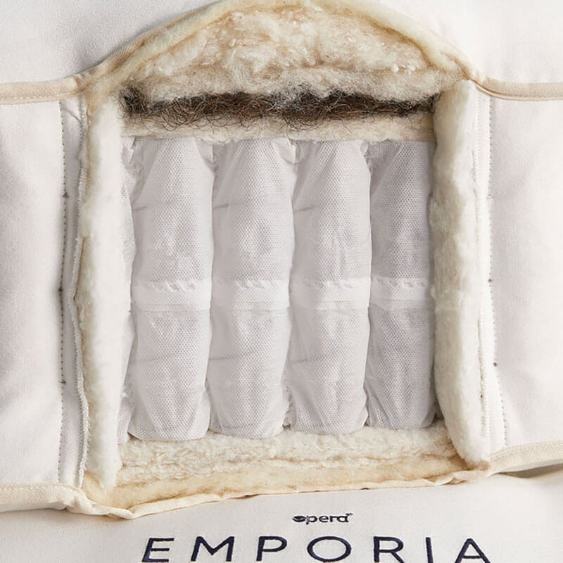 The Emporia Natural Luxury Adjustable Mattress is a luxurious, comfortable adjustable bed with 1500 hand-teased pocket springs and layers of natural fillings, offering a deep, deep, and sumptuous experience, with customizable soft, medium, or firm feel options.