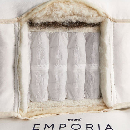 The Emporia Natural Luxury Adjustable Mattress is a luxurious, comfortable adjustable bed with 1500 hand-teased pocket springs and layers of natural fillings, offering a deep, deep, and sumptuous experience, with customizable soft, medium, or firm feel options.