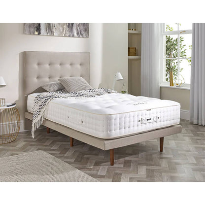 The Emporia Natural Luxury Adjustable Mattress is a luxurious, comfortable adjustable bed with 1500 hand-teased pocket springs and layers of natural fillings, offering a deep, deep, and sumptuous experience, with customizable soft, medium, or firm feel options.