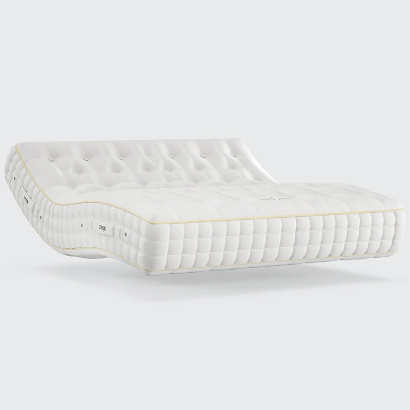 The Emporia Natural Luxury Adjustable Mattress is a luxurious, comfortable adjustable bed with 1500 hand-teased pocket springs and layers of natural fillings, offering a deep, deep, and sumptuous experience, with customizable soft, medium, or firm feel options.