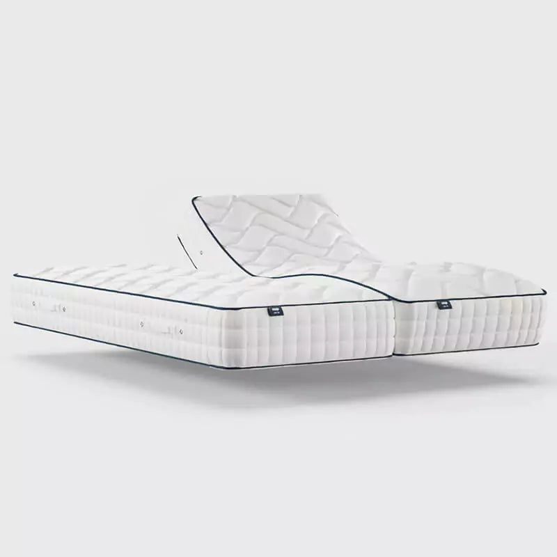 The Opera Gel 1000 Adjustable Mattress is a comfortable, multilayer mattress with a 2/5 firmness, featuring 1000 pocket springs, high-density foam shell, memory and gel-infused foams, carry handles, and a ventilated top cover.