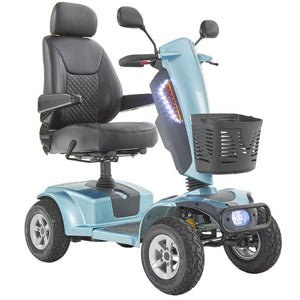 The Motion Healthcare Xcite Li Mobility Scooter offers a 45-mile range and 8 mph top speed with safe lithium phosphate batteries. It features large wheels, suspension, a padded Captain's seat, and an adjustable tiller.  Ideal for all terrains, it includes lights, indicators, a horn, and high ground clearance, supporting up to 25 stone. Additional conveniences are a storage basket and USB charging port.  The Xcite Li combines modern styling, ease of use, and robust performance for all journeys.